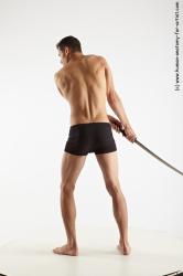 Underwear Fighting with sword Man White Athletic Short Brown Academic